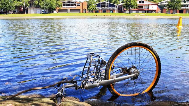 A submerged oBike discarded along the Yarra River. Picture: Aaron Francis/The Australian