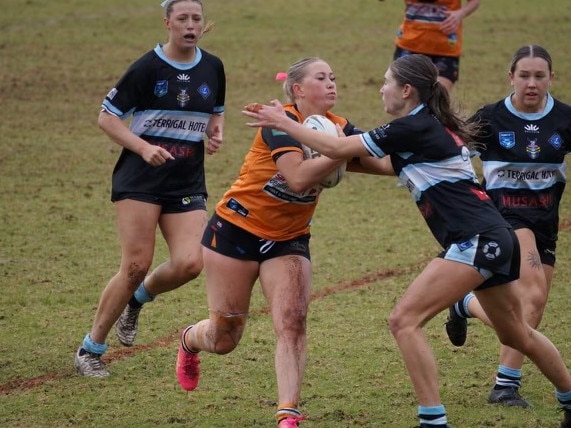 The Entrance Tigers' women's tackle rugby league team playing against the Terrigal Sharks in the 2024 Rugby League Central Coast competition. Picture: supplied