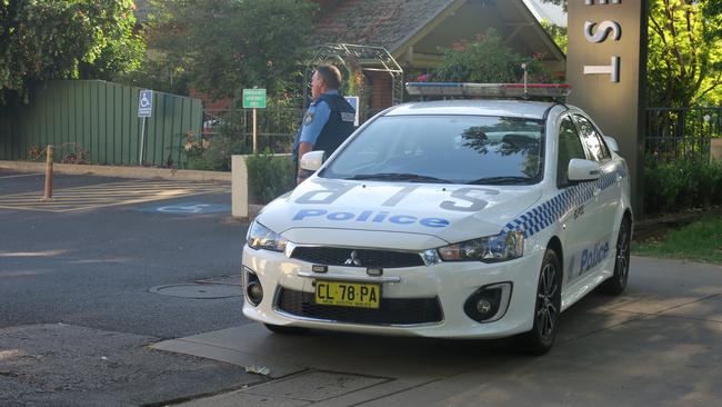 Wagga police surround a section of Gurwood Street yesterday. Picture: Toby Vue