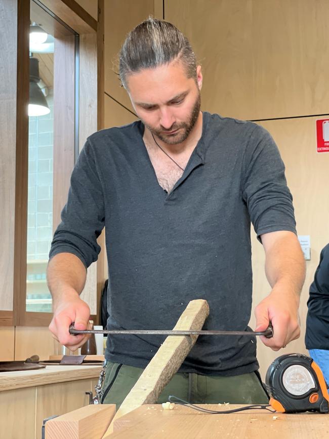 Shaving a stave to size.