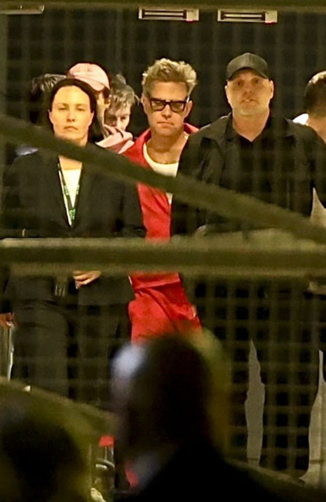 Robbie Williams arrives at Sydney Airport on December 30 ahead of his New Year's Eve performance on Sydney Harbour. Picture: ©MEDIA-MODE.COM