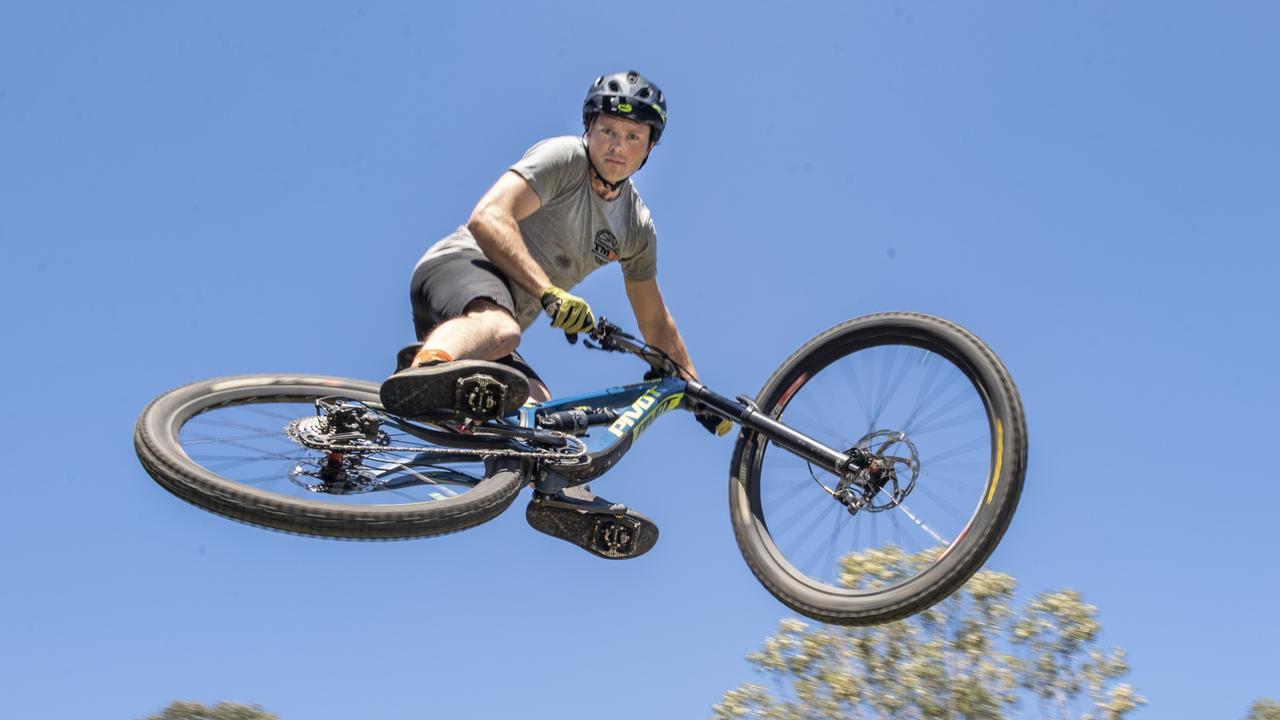 JUMPING FOR JOY: David Warner, president of Toowoomba Mountain Bike Club, was thrilled the federal government announced it was committing $3.33m to the Escarpment Mountain Bike Master Plan. Picture: Nev Madsen.