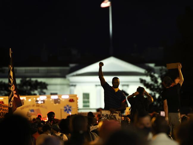 Protesters at a "Trump/Pence Out Now" rally near the White House. Picture: AFP.