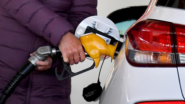 BRISBANE, AUSTRALIA - NewsWire Photos JUNE 10, 2022:  People filling up and petrol prices in Brisbane.Australiaâs petrol prices are now surpassing the dizzying heights seen earlier this year as motorists struggle to afford the soaring costs.Picture: NCA NewsWire / John Gass