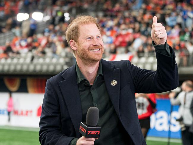 Prince Harry acknowledges fans prior to the start of a TV interview before the start of the 2024 Grey Cup in Vancouver, Canada. Picture: Getty Images via AFP