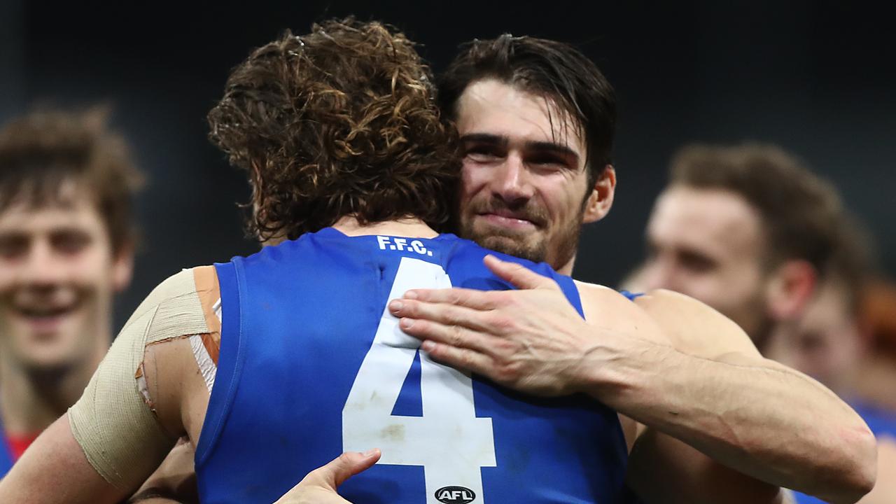 Bulldogs stars Easton Wood and Marcus Bontempelli celebrate the victory over GWS last weekend.
