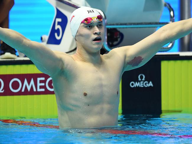 Sun Yang of China celebrates after winning the Men's 200m Freestyle Final.