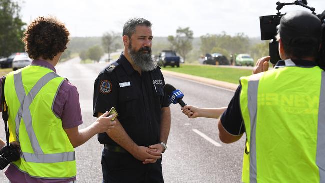 Detective Senior Sergeant Brendan Linder addresses the media at the scene of a crash which killed 57-year-old Jo Neyens in February.