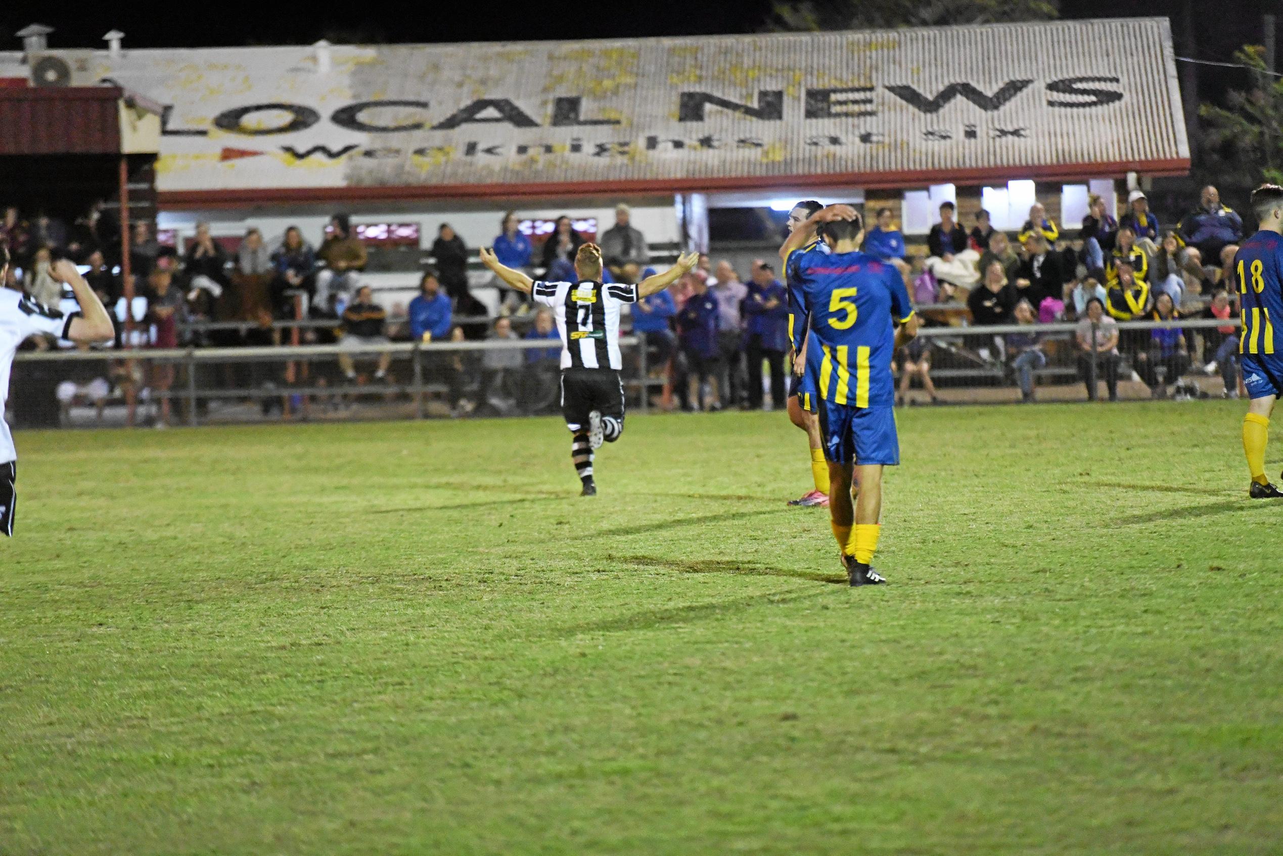 Bingera's Shaun Sergiacomi celebrates scoring a goal in extra time. Picture: Shane Jones