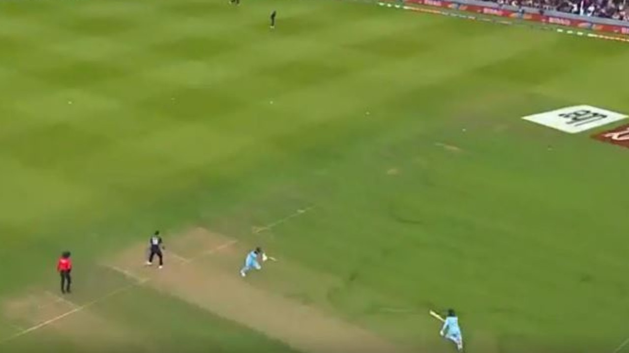 Martin Guptill throws to the keeper with England's batsmen yet to coss.