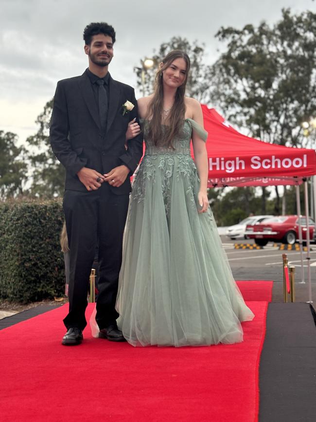 Students from Urangan State High School arrive at their formal.