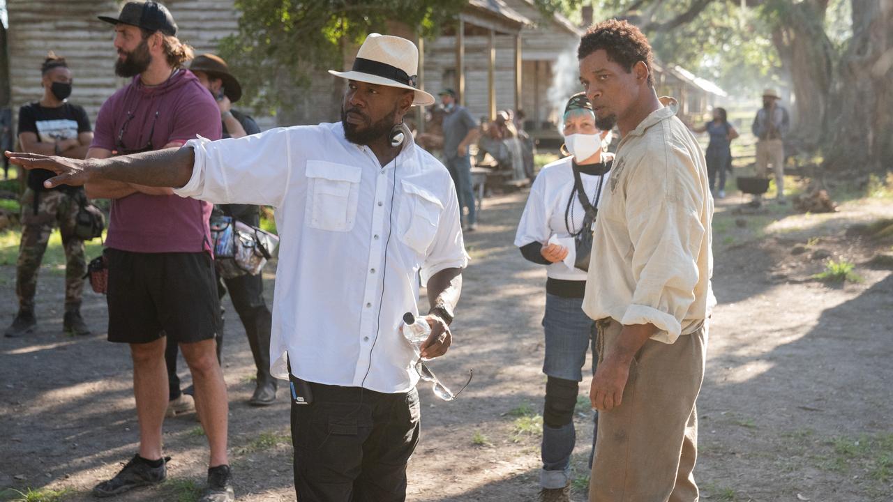 Director Antoine Fuqua and Will Smith discuss a scene from Emancipation.