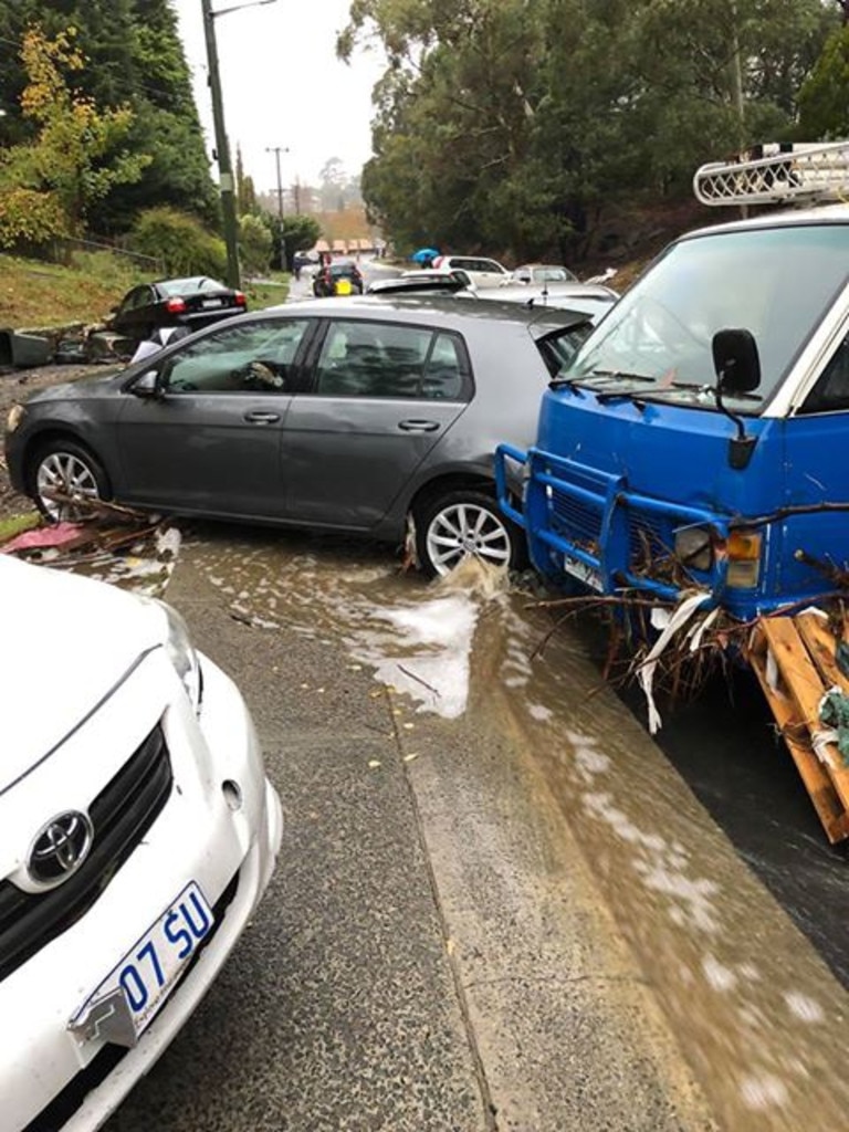 Flood damage to the roadway in McRobies Rd/Syme St, South Hobart. Picture: MATT HASTINGS