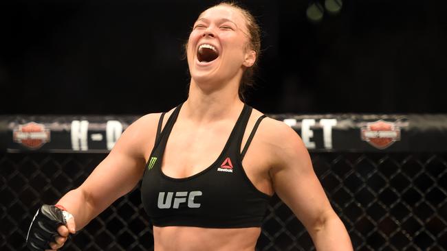 Ronda Rousey celebrates a UFC win.