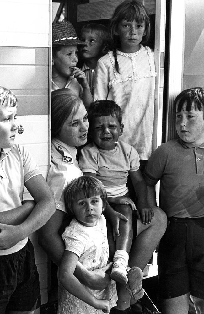 March 1970: A policewoman comforts lost children at the police caravan at Moomba. Picture: Herald Sun