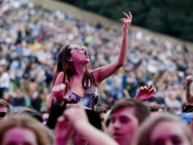 A female dancing and listening to San Cisco playing at the Amphitheate on Friday at Splendour in the Grass 2015 at Byron Bay. Picture: Jerad Williams.