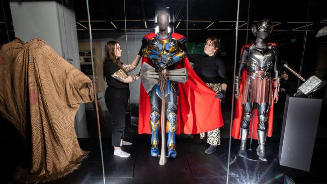 ACMI curators Megan Taylor and Cody Buchanan preparing the exhibition. Picture: Jason Edwards