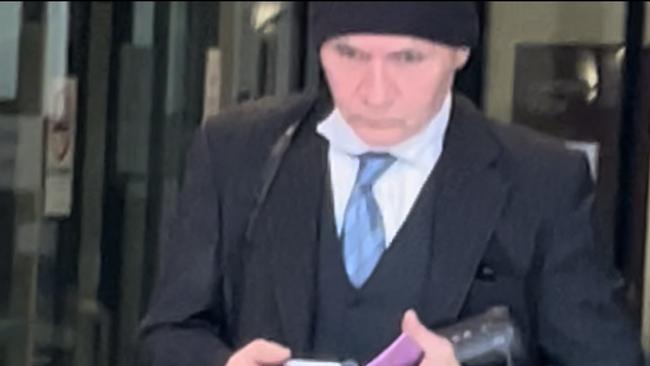 Joseph Rosenburg leaves Downing Centre Local Court.