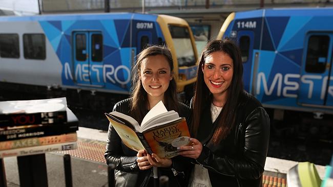 Michelle Kalus and Ali Berg have started Books on the Rail, a movement in which people leave books on Melbourne's public transport system for unsuspecting commuters to discover, read and then leave for someone else to enjoy. Picture: Stuart Milligan