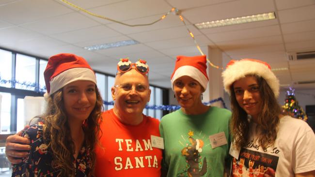 Volunteers at the 2022 Cairns Community Christmas Lunch included: L-R Milly Javis, Greg T Jones, Jo Jarvis and Ella Jarvis. Picture: Alison Paterson