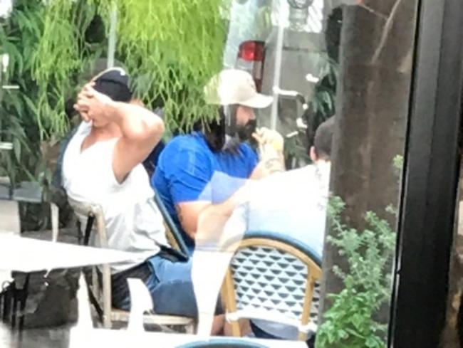 Wests Tigers forward Aaron Woods having a catch-up with Josh Jackson and other Canterbury Bulldogs players at Roselands. Picture: Supplied