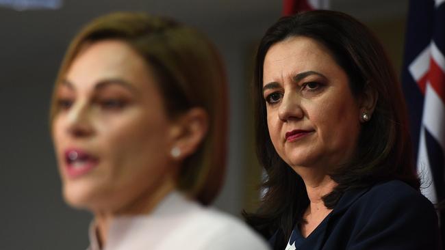 Queensland Premier Annastacia Palaszczuk (right) and Treasurer Jackie Trad are seen during a press conference in the state budget media lockup at Parliament House in Brisbane, Tuesday, June 12, 2018. Ms Trad will today deliver her first budget. (AAP Image/Dan Peled) NO ARCHIVING