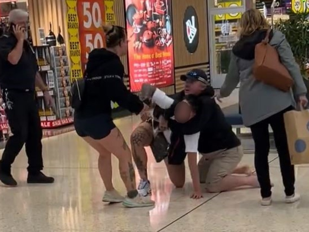 A woman is detained at a Toowoomba shopping centre.