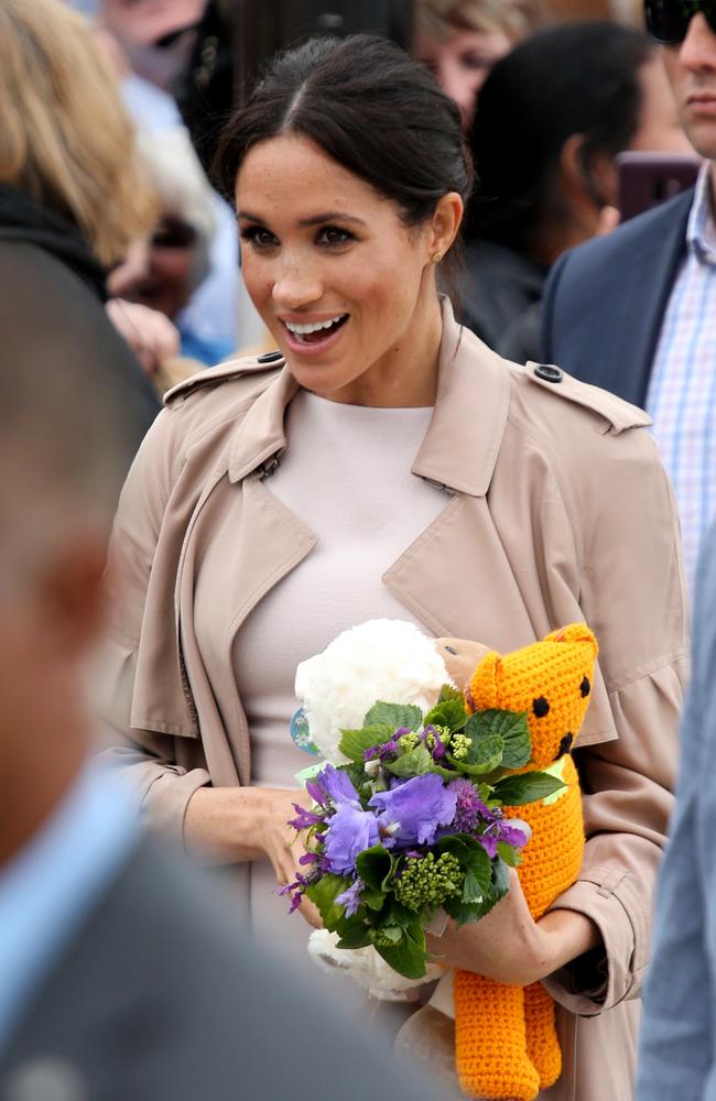 The Duchess of Sussex received some cute baby gifts during the Auckland walkabut. Picture:  Nathan Edwards.