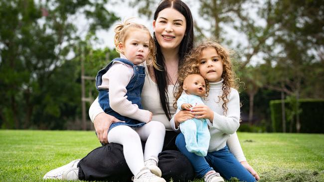 Therese Callaghan with her daughters Kai, 2, and Alarie, 4, at Nurragingy Reserve. Picture: Tom Parrish