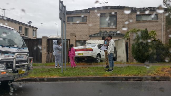 The car lodged in the shed.