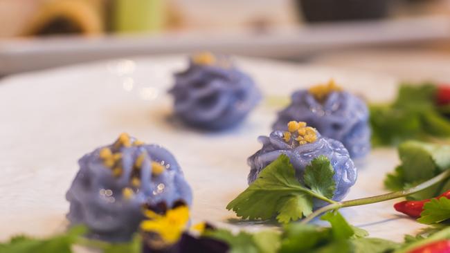 Gorgeous whorls: Butterfly pea flower steamed dumplings with sand crab, coriander and white pepper