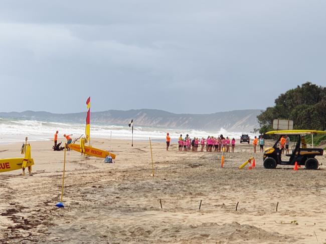 Flags will be taken at Rainbow Beach tomorrow to help with social distancing guidelines. Last month scores of Nippers are seen enjoying the beach on a Sunday morning.