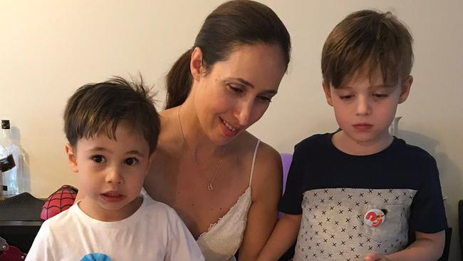 Sandra Silfani is finding it more difficult to stop her sons Michael (9, right) and Ethan (8, left) from spending money on games like their friends