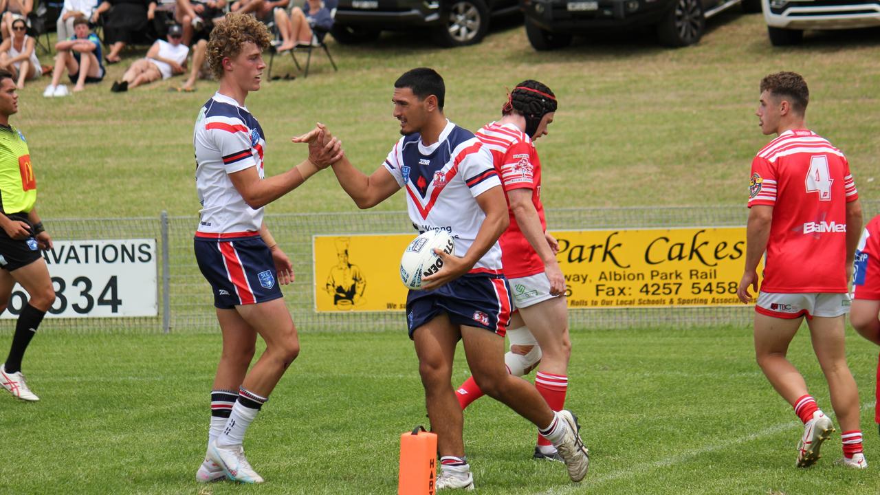The Central Coast Roosters celebrate a try to #22. Picture: Kevin Merrigan