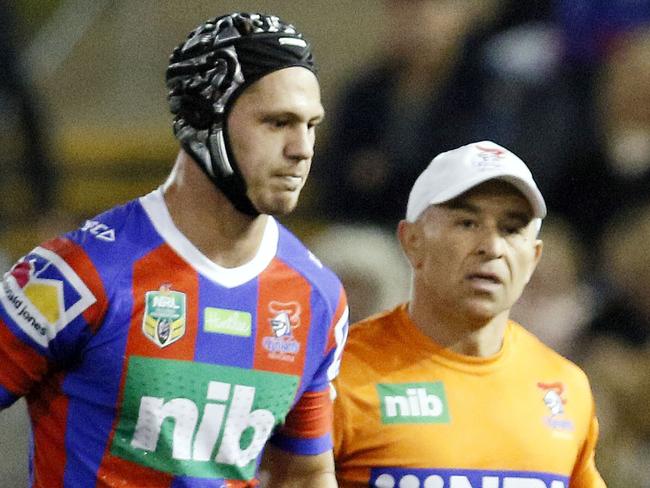 Kalyn Ponga of the Knights leaves the field with a hamstring injury during the Round 16 NRL match between the Newcastle Knights and the Canterbury-Bankstown Bulldogs at McDonald Jones Stadium in Newcastle, Saturday, June 30, 2018. (AAP Image/Darren Pateman) NO ARCHIVING, EDITORIAL USE ONLY