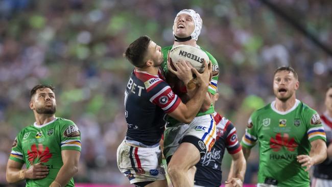 Jarrod Croker and James Tedesco of the Roosters contest a bomb during the 2019 NRL Grand Final between the Canberra Raiders and the Sydney Roosters at ANZ Stadium in Sydney, Sunday, October 6, 2019. (AAP Image/Craig Golding) NO ARCHIVING, EDITORIAL USE ONLY