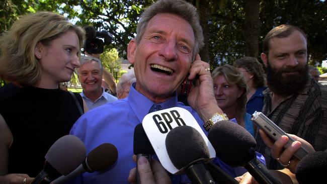 John Button faces the media after his name was cleared in 2002. Picture: Ross Swanborough