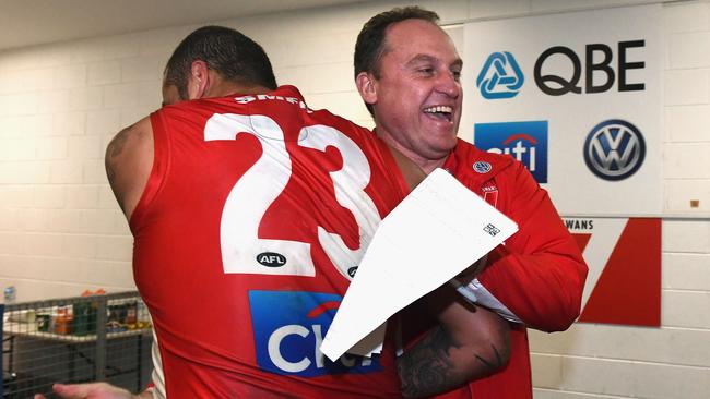 Sydney coach John Longmire embraces Lance Franklin after the preliminary final.