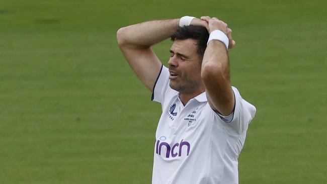 Jimmy Anderson’s face paints a picture on another difficult day for the home side. Picture: AFP