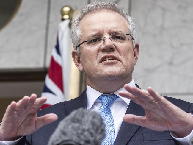 Prime Minister Scott Morrison with CMO Brendan Murphy during a press conference at Parliament House in Canberra. Picture Gary Ramage