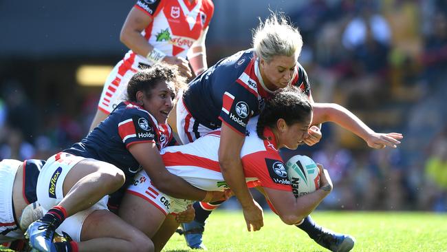 Ruan Sims taking down Najvada George at Leichhardt Oval last weekend. The Dragons won the game to advance into the grand final of the NRLW competition.