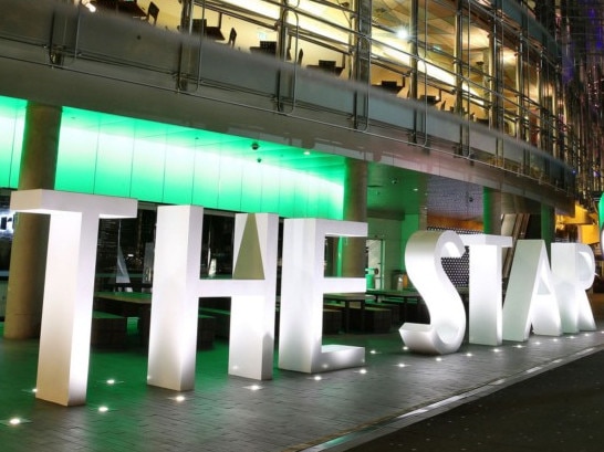 The Star casino, operated by Echo Entertainment Group Ltd., stands illuminated at night in Sydney, Australia, on Monday, Aug. 10, 2015. Echo Entertainment is scheduled to report full-year results on Aug. 12. Photographer: Brendon Thorne/Bloomberg