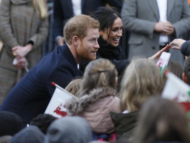 Britain’s Prince Harry and his fiancee Meghan Markle meet fans as they arrive for a visit to Cardiff Castle in Cardiff, Wales, Thursday, Jan.18, 2018. Picture: AP