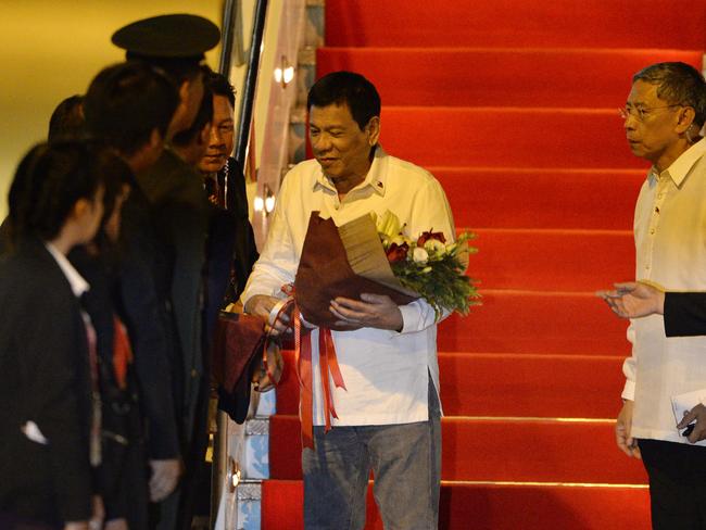 Philippine President Rodrigo Duterte touches down in Laos for the ASEAN Summit. Picture: AFP/Noel Celis