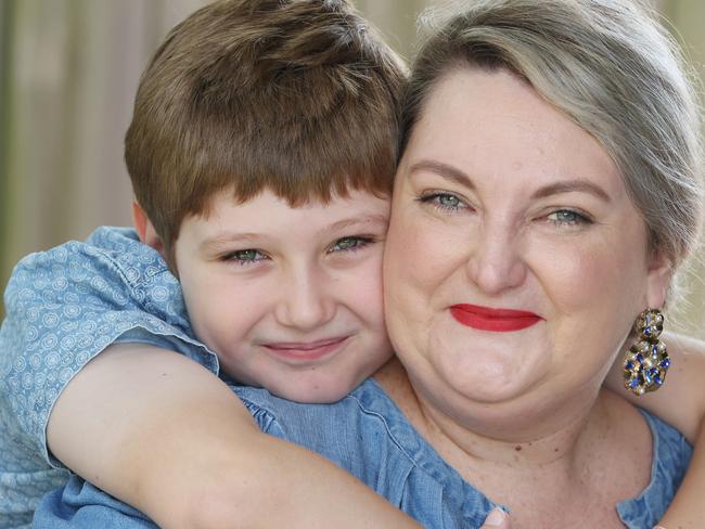 Brisbane mother Abby Stiefel  with her 9-year-old son Felix  at their home. Dog is called Ernest Pizza .Pic Annette Dew