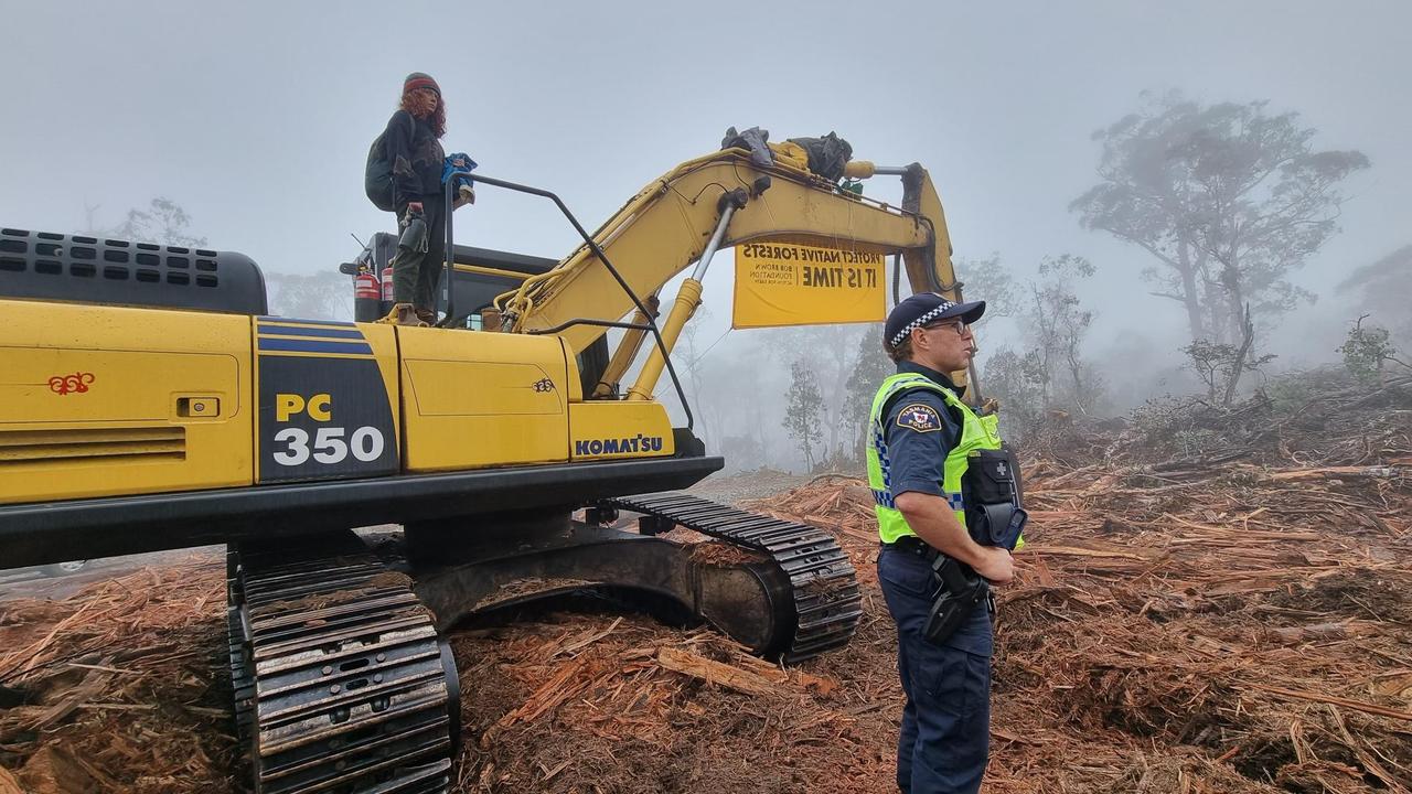 Bob Brown Foundation protesters attached to logging equipment at Wentworth Hills on Tasmania's Central Plateau.