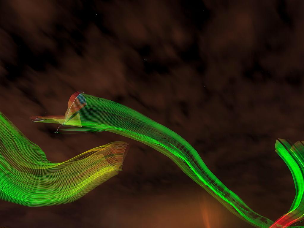 The kites in action at Clontarf’s Pelican Park at night ahead of Redcliffe KiteFest. Photo: Josh Woning.