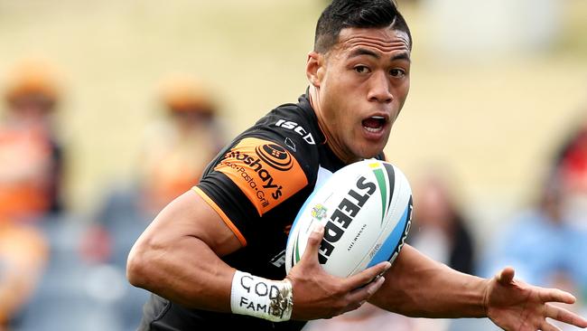 Tigers Tim Simona makes a break during the NRL game between the Wests Tigers and the New Zealand Warriors at Campbelltown Stadium , Campbelltown.Picture Gregg Porteous