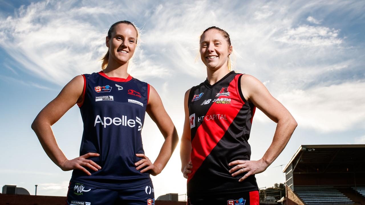 SANFLW players Alison Ferrall (Norwood) and Bec Owen (West Adelaide) at Thebarton Oval on May 18, 2021.  The SANFLW finals start this weekend with Norwood taking on Glenelg and West Adelaide playing South Adelaide. Picture Matt Turner.