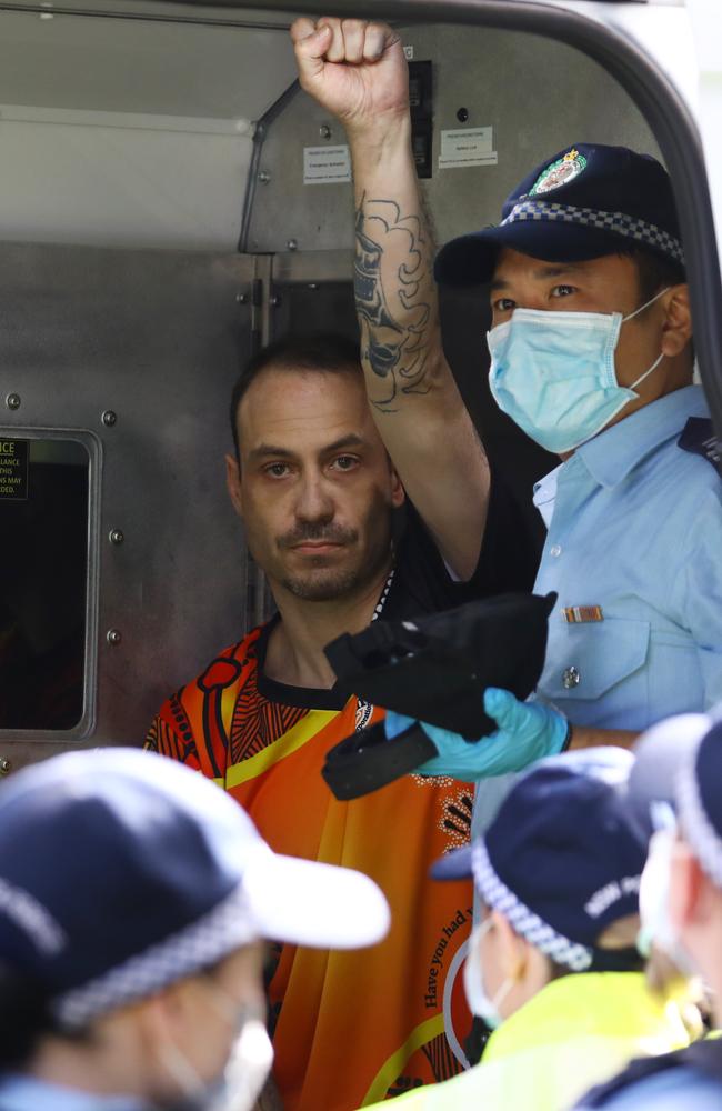 A protester in the back of a police van. Picture: Matrix